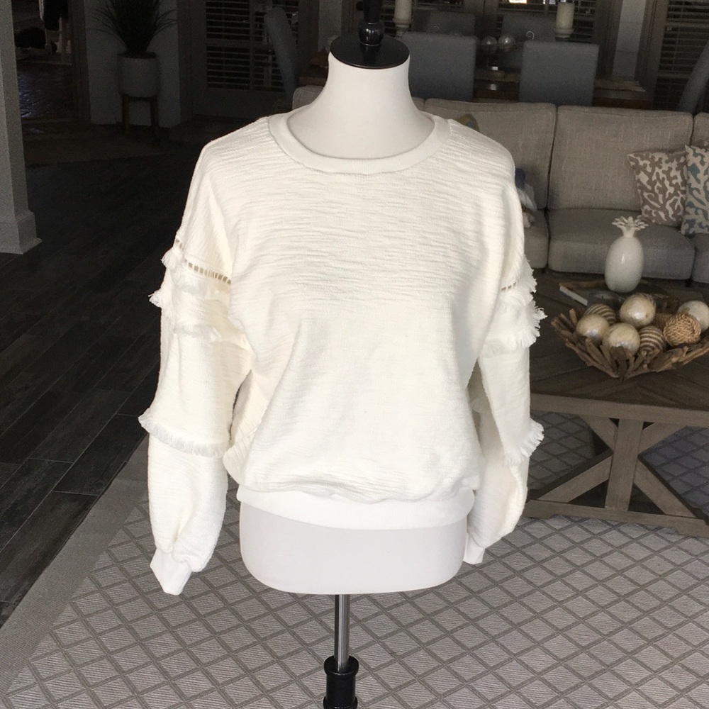 White ruffled sleeve top